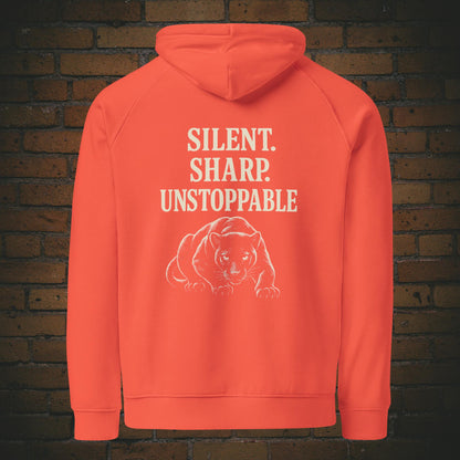Silent Sharp Unstoppable Hoodie – Schwarzer Panther Bio Unisex - Druck auf dem Rücken - Kapuzenpullover für Frau und Mann in der Farbe: orange
