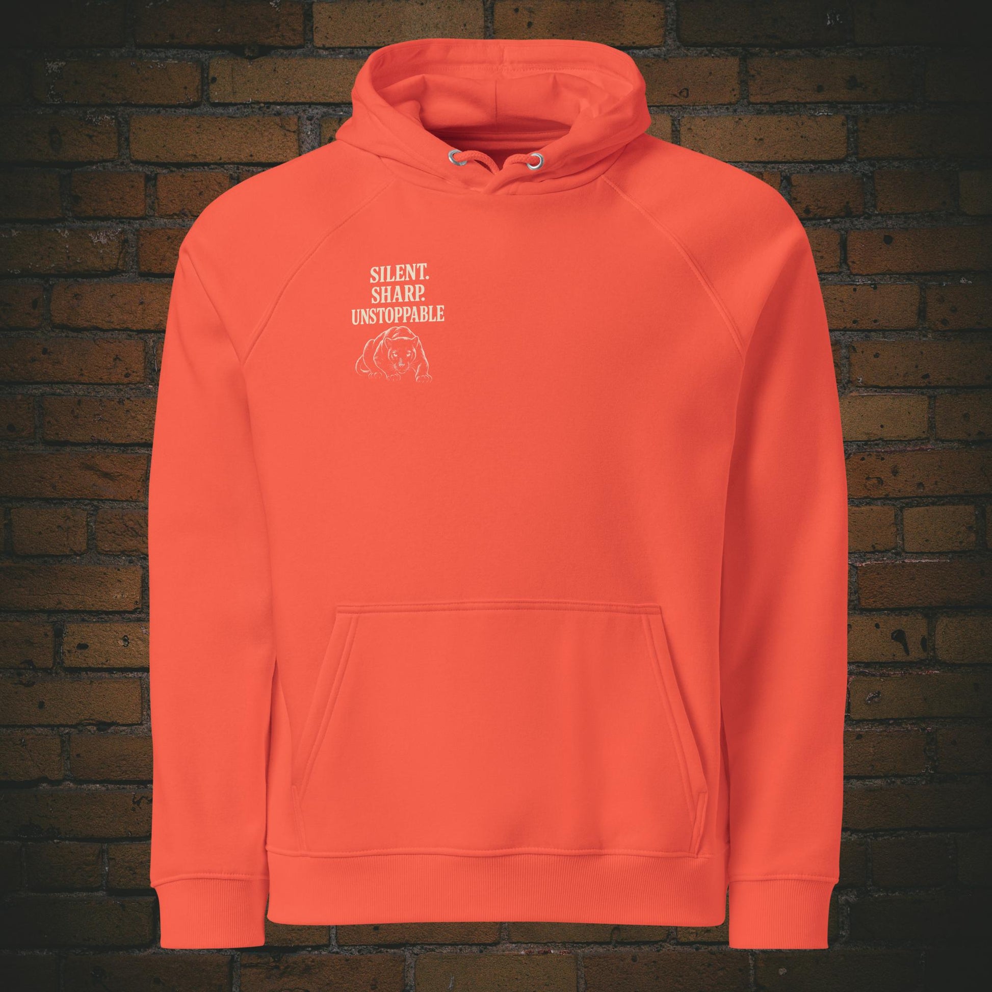 Silent Sharp Unstoppable Hoodie – Schwarzer Panther Bio Unisex - Druck auf dem Brust - Kapuzenpullover für Frau und Mann in der Farbe: orange