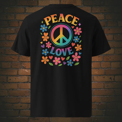 T-Shirts mit buntem Peace-Zeichen und „Peace Love“-Spruch, umgeben von Blumen und Herzen im Hippie-Stil, Front- und Rückenansicht in schwarz 
