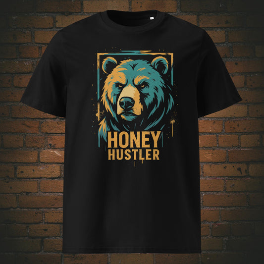 T-Shirt mit stylischem Bärenkopf im Graffiti-Look, kombiniert mit frechem Spruch „Honey Hustler“ – ideal für starke Charaktere mit Humor. Shirtfarbe: schwarz